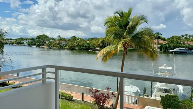 a view of a lake from a balcony