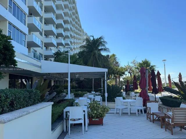 a view of a terrace with sitting area