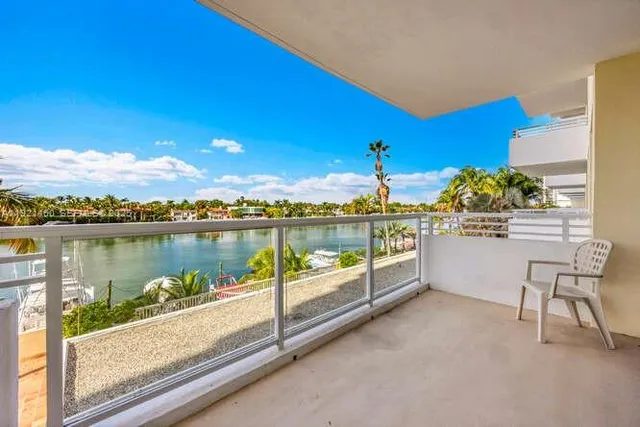 a view of a swimming pool and lounge chair