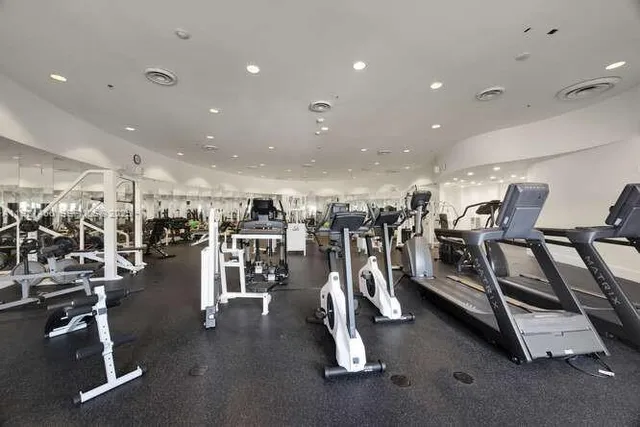 a view of swimming pool from a balcony