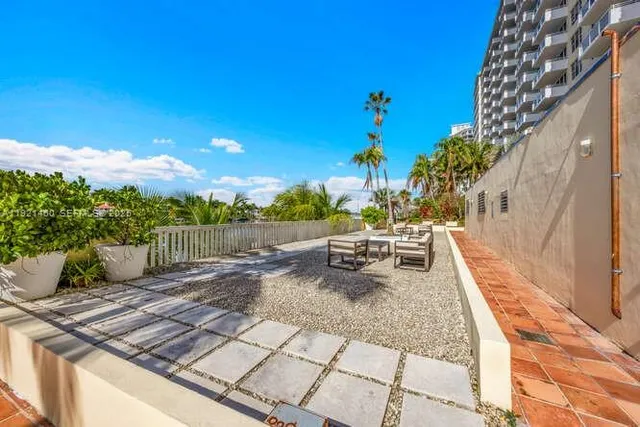 a view of a yard with an outdoor space