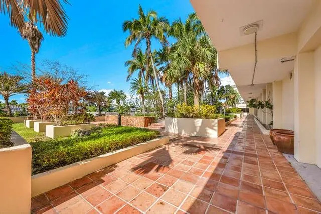 a view of a lake with houses in the back