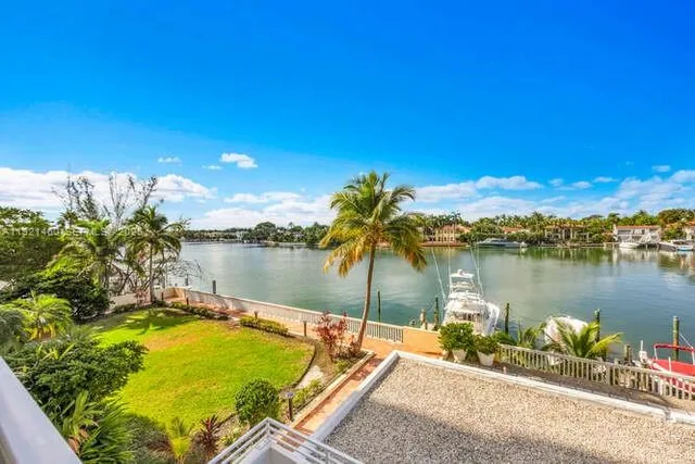 a view of a lake from a balcony