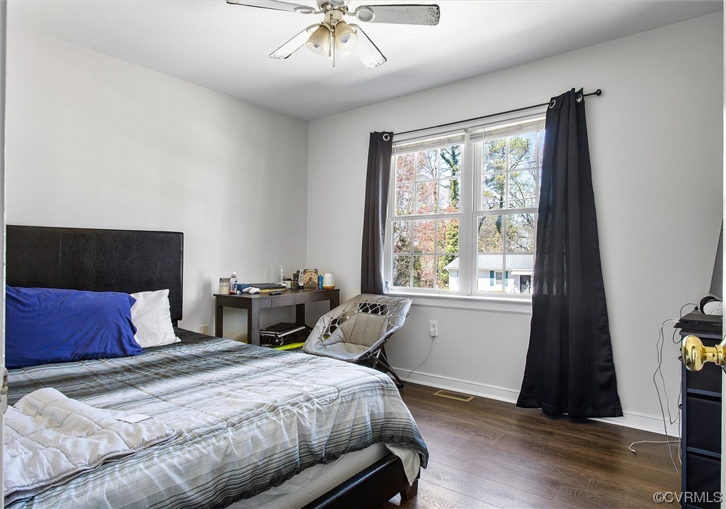 8911 Midway Road Henrico, VA 23229 - Photo 18 of 30 a bedroom with bed and window