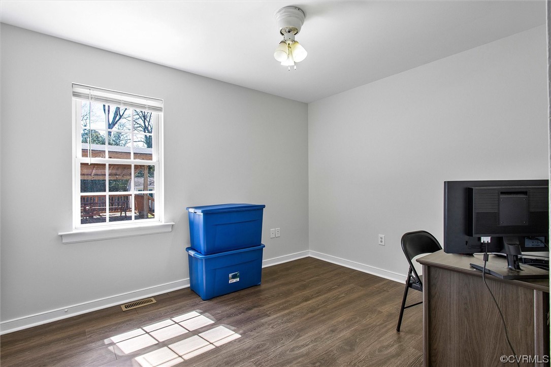 8911 Midway Road Henrico, VA 23229 - Photo 19 of 30 a workspace with furniture hardwood and a window