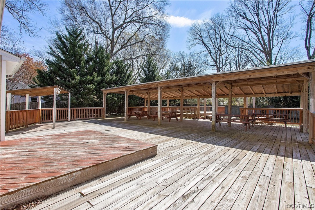 8911 Midway Road Henrico, VA 23229 - Photo 21 of 30 a view of house with wooden floor and large trees