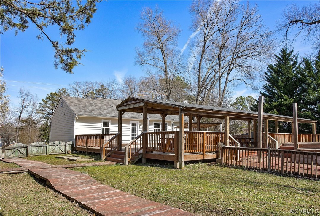 8911 Midway Road Henrico, VA 23229 - Photo 29 of 30 a view of a house with backyard and porch