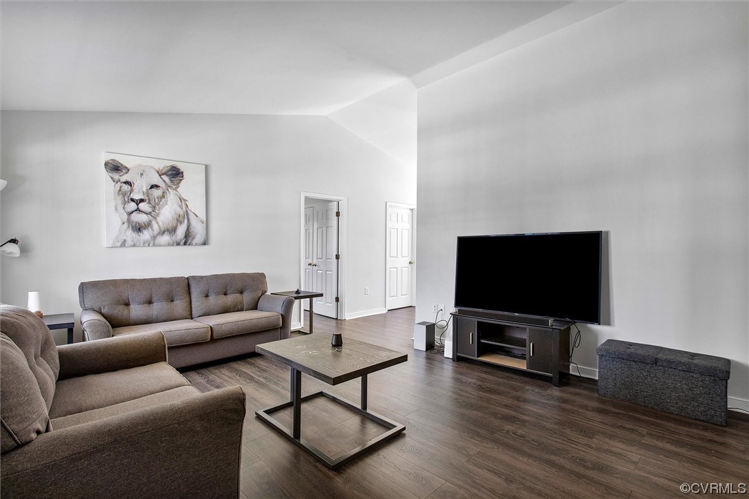 8911 Midway Road Henrico, VA 23229 - Photo 6 of 30 a living room with furniture and a flat screen tv
