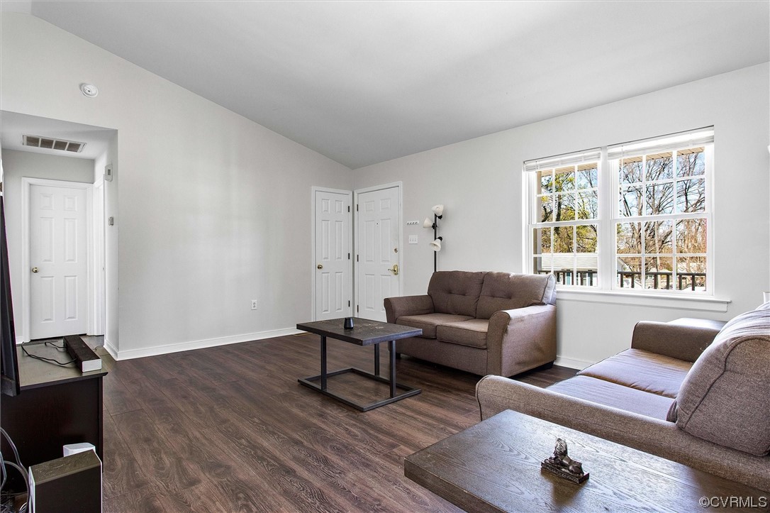 8911 Midway Road Henrico, VA 23229 - Photo 8 of 30 a living room with furniture and a window