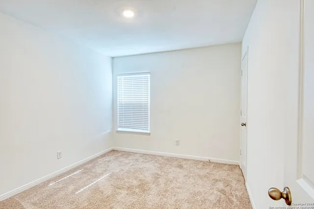 an empty room with a workbench