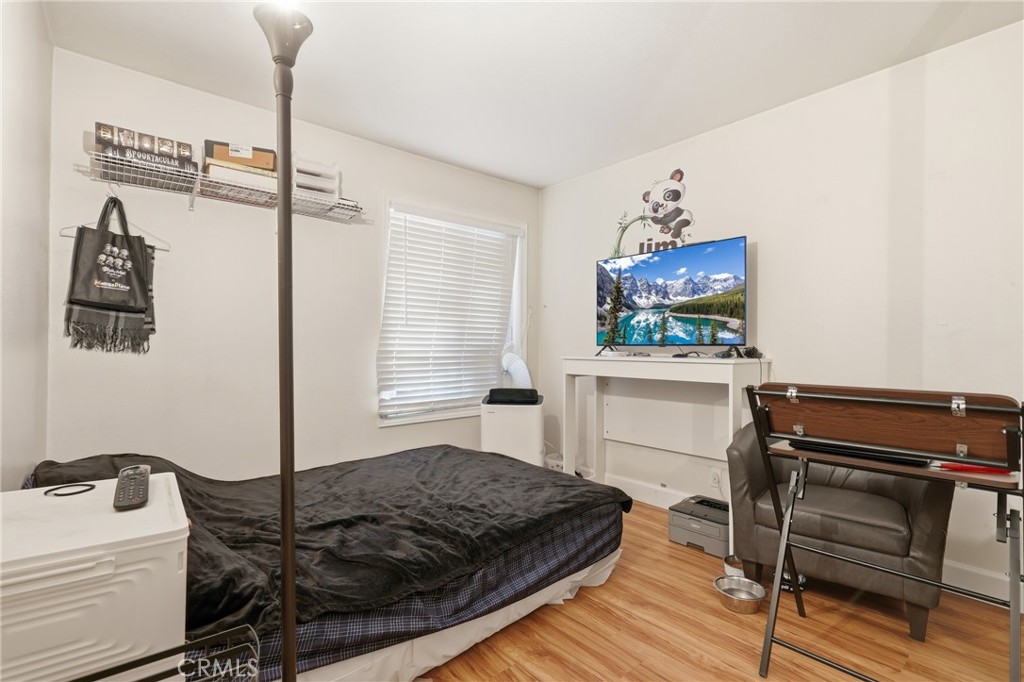 3575 Falconridge Road Yorba Linda, CA 92886 - Photo 12 of 21 a bedroom with a bed and a flat screen tv