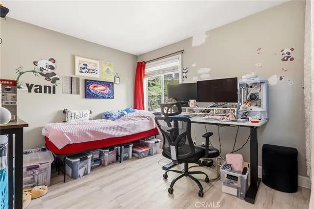 a view of a storage & utility room with closet dryer and washer