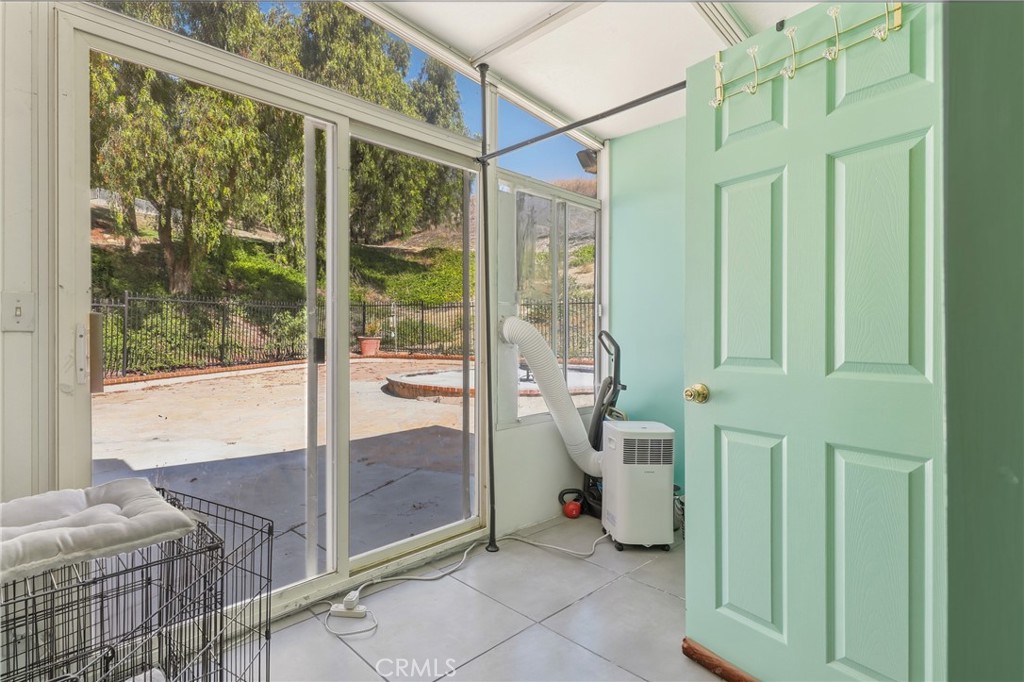 3575 Falconridge Road Yorba Linda, CA 92886 - Photo 17 of 21 a living room with a large window and furniture