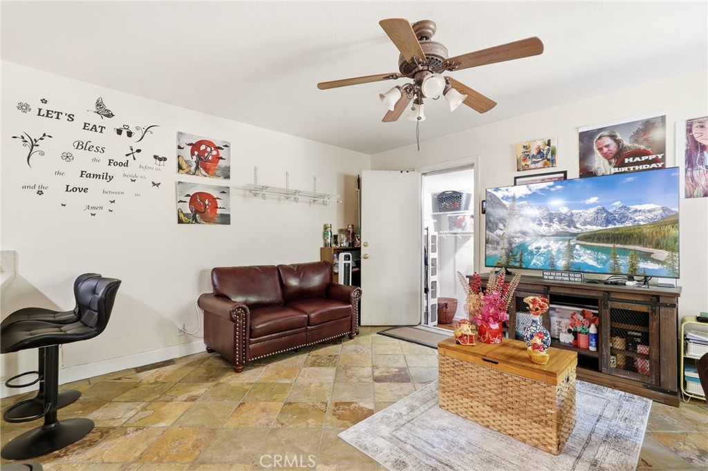 3575 Falconridge Road Yorba Linda, CA 92886 - Photo 5 of 21 a living room with furniture and a floor to ceiling window