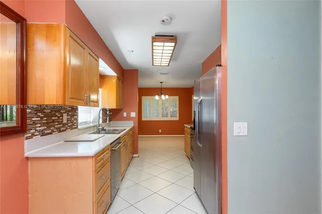 a bathroom with a sink a mirror and a bathtub