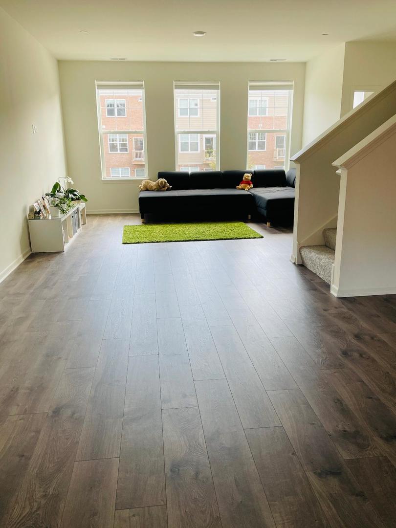 48 Grey Wolf Drive Wheeling, IL 60090 - Photo 5 of 23 a living room with furniture and a window
