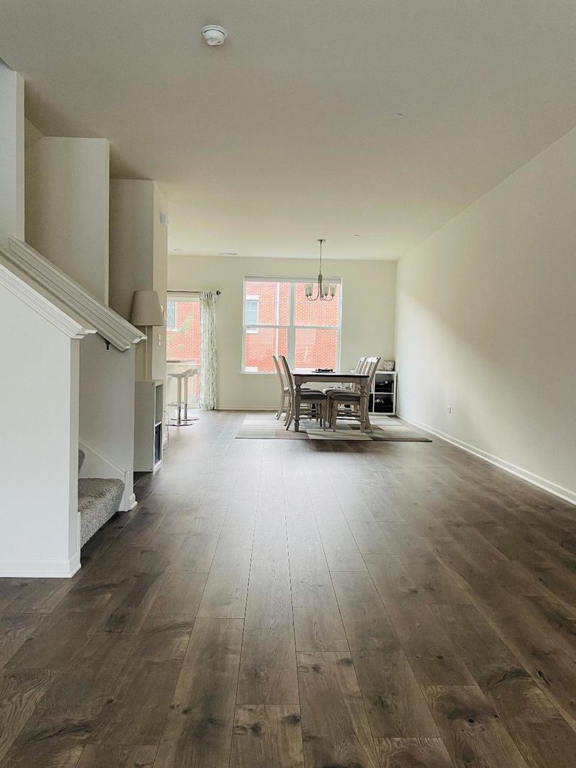 48 Grey Wolf Drive Wheeling, IL 60090 - Photo 6 of 23 a living room with furniture and a fireplace