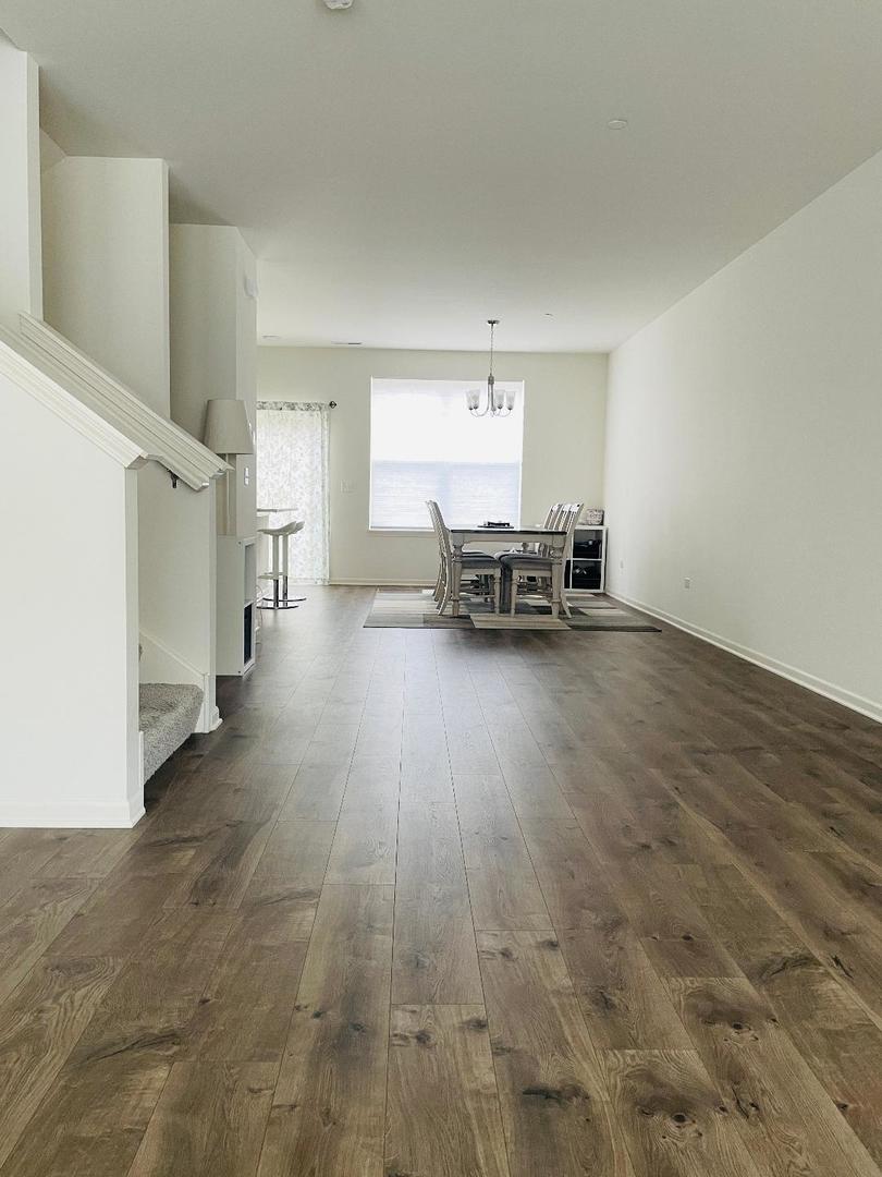 48 Grey Wolf Drive Wheeling, IL 60090 - Photo 7 of 23 a view of livingroom with furniture and a window