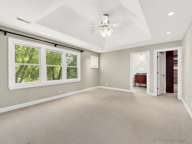 908 Ranch Road Wheaton, IL 60187 - Photo 15 of 25 a view of an empty room with a window