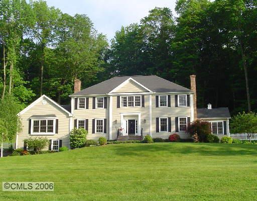 192 Old Branchville Road Ridgefield, CT 06877 - Photo 1 of 1 a front view of a house with a garden