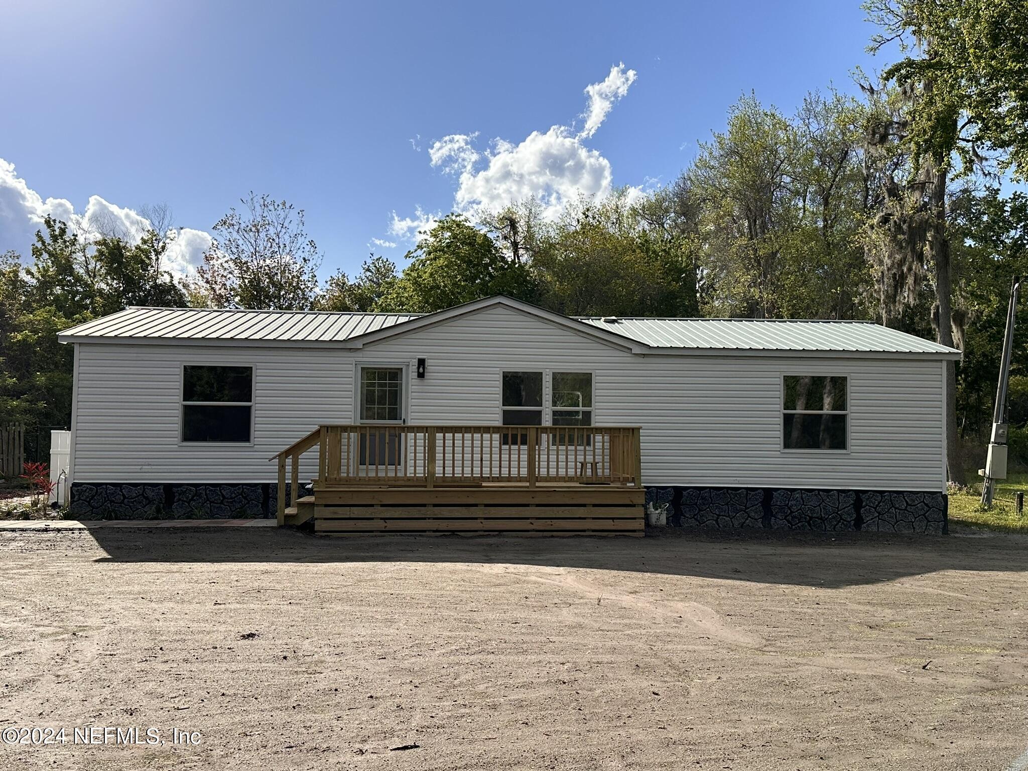 96757 Blackrock Road Yulee, FL 32097 - Photo 6 of 21 a view of a house with a backyard