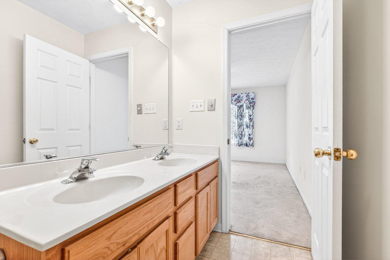 849 South Ox Road Woodstock, VA 22664 - Photo 33 of 51 Primary bathroom with dual sinks.