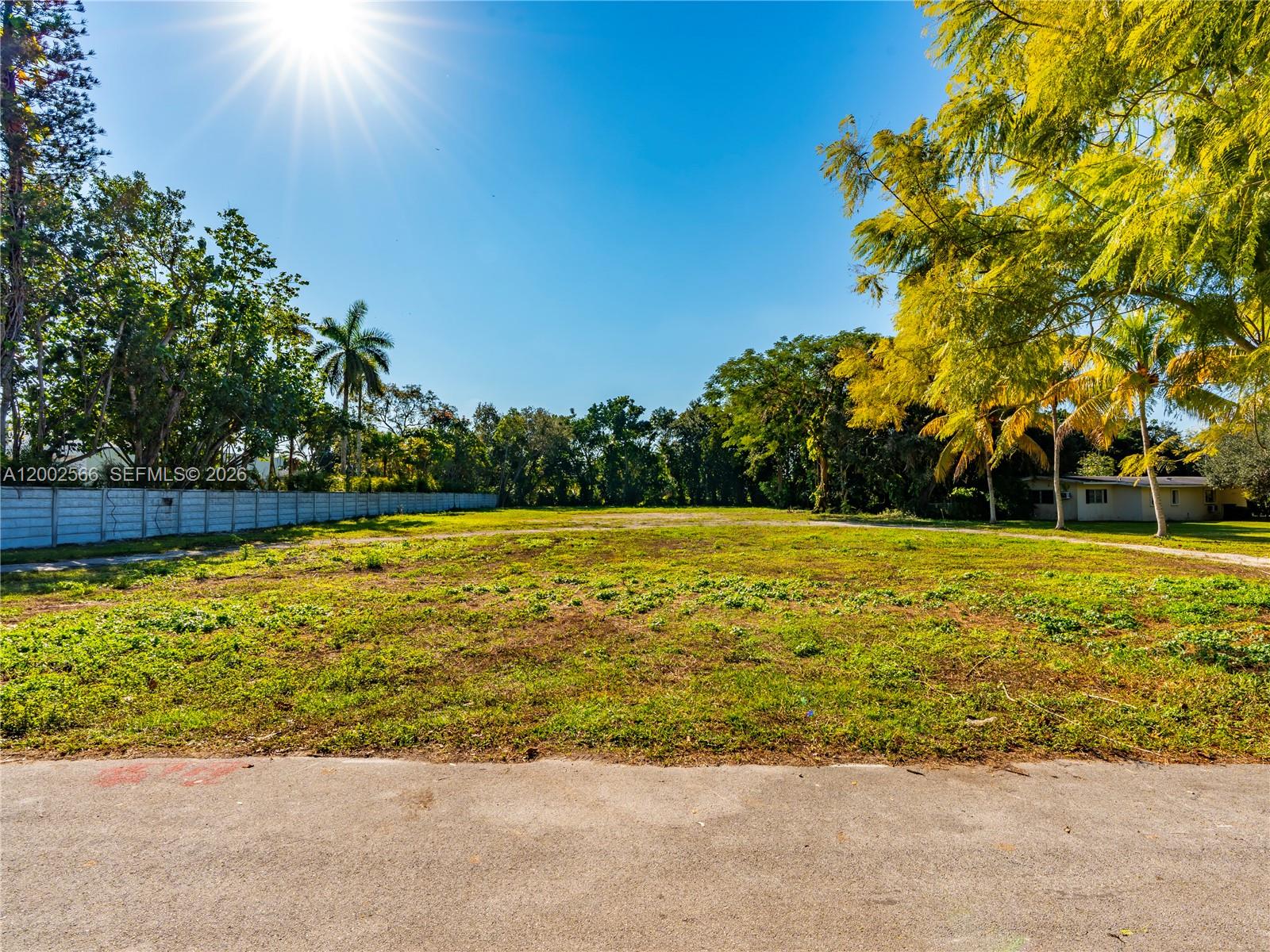9800 Southwest 114th Street Miami, FL 33176 - Photo 3 of 3 a view of swimming pool with an outdoor space and seating area