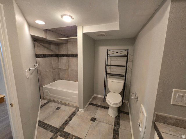 490 Averett Avenue, Unit 1 Springville, UT 84663 - Photo 5 of 11 Bathroom featuring shower / tub combination, light tile patterned flooring, and recessed lighting