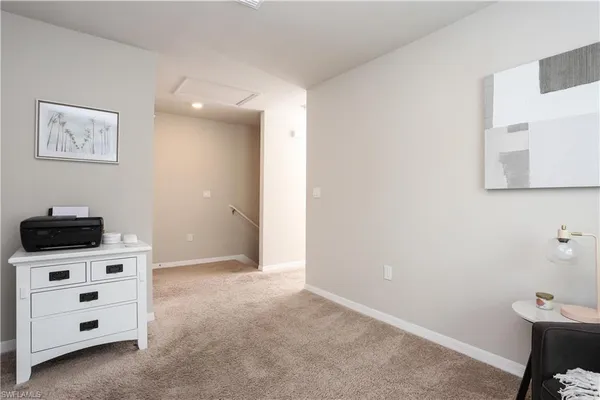 a kitchen with stainless steel appliances a refrigerator a stove a microwave and cabinets