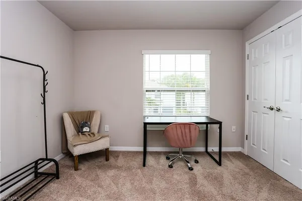 a view of a room with a window