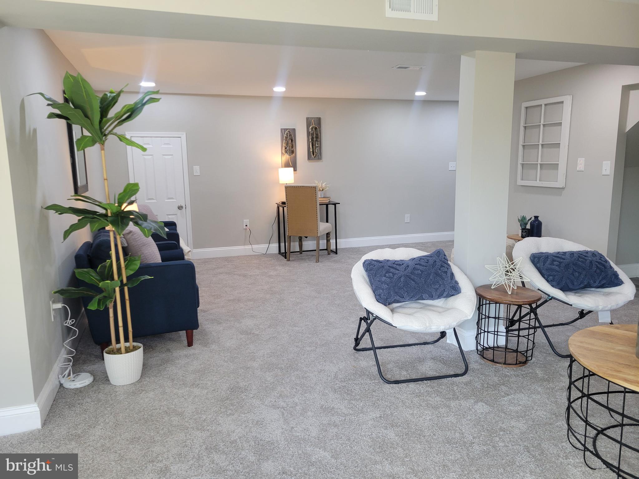 5303 Emory Road Upperco, MD 21155 - Photo 14 of 33 a room with furniture and a potted plant