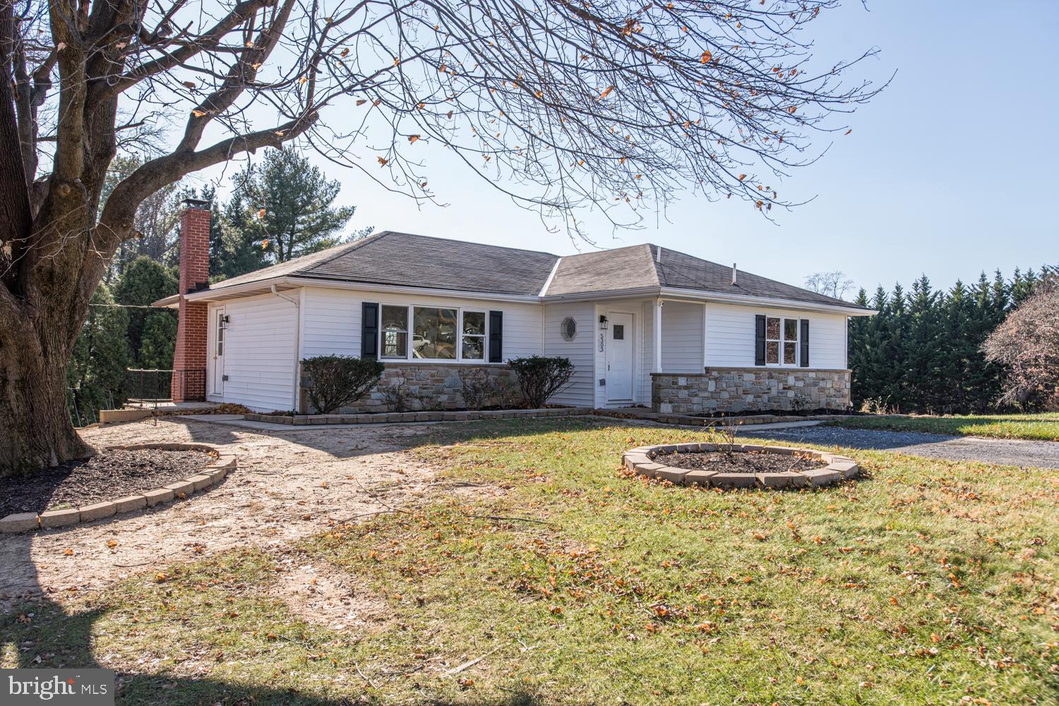 5303 Emory Road Upperco, MD 21155 - Photo 19 of 33 a front view of a house with a yard