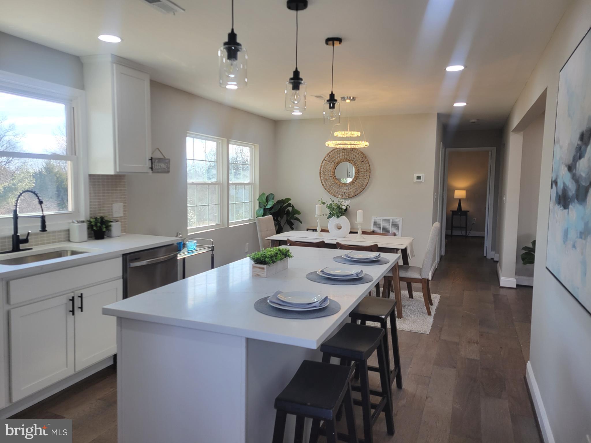 5303 Emory Road Upperco, MD 21155 - Photo 6 of 33 a large kitchen with a table and chairs
