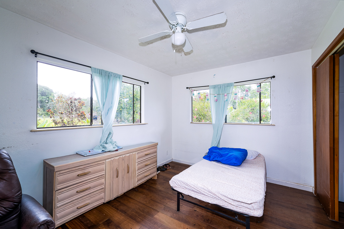 15-2808 Moi Street Pahoa, HI 96778 - Photo 6 of 11 a room with furniture and window