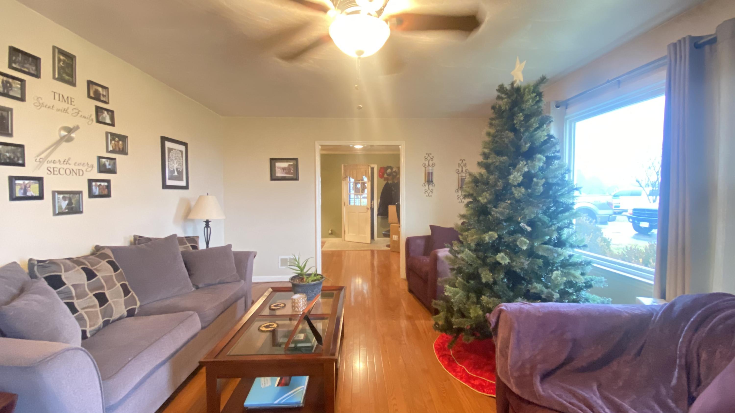1171 Rock Spring Road Goodview, VA 24095 - Photo 7 of 29 a living room with furniture and a large window