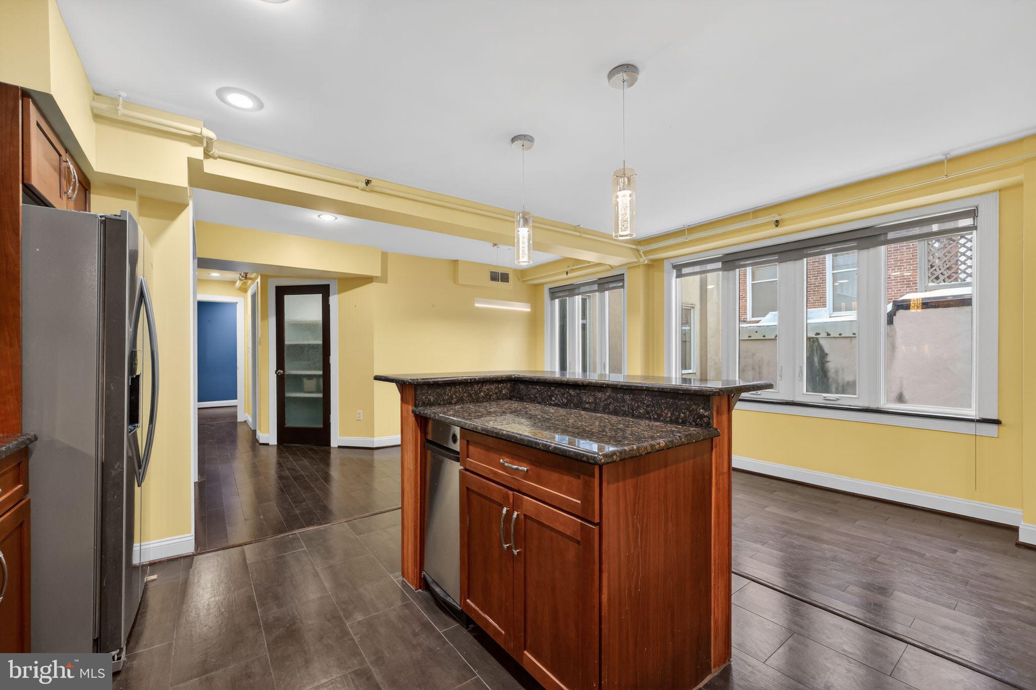 126 Cuthbert Street, Unit 3 Philadelphia, PA 19106 - Photo 13 of 32 Kitchen Island to Dining Space