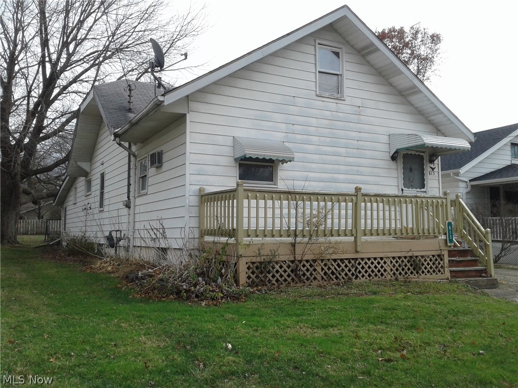 613 Jackson Street Amherst, OH 44001 - Photo 2 of 29 Front of home with a deck to the front living room