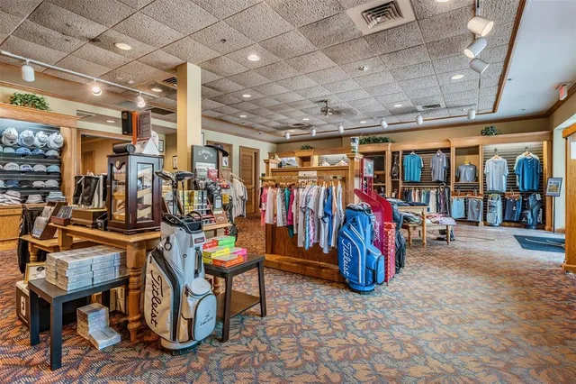 an aerial view of a residential houses with outdoor space