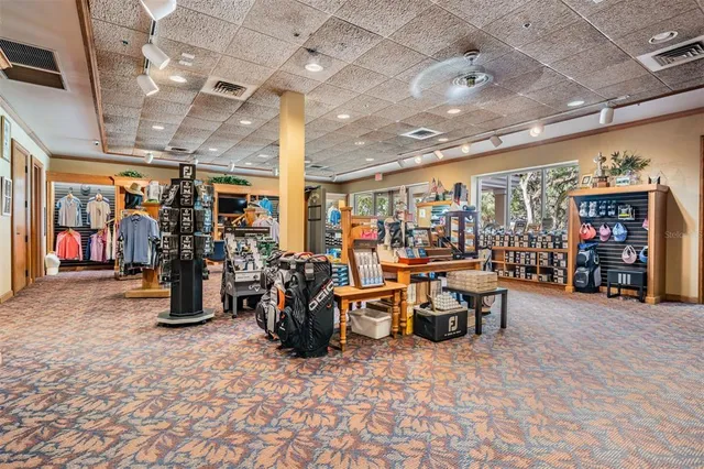 an aerial view of a house with garden space lake view and mountain view in back