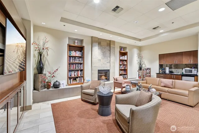a living room with furniture or couch and a fireplace