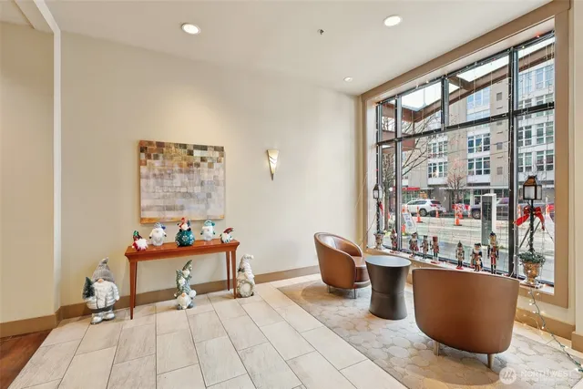 a room with wooden floor and furniture