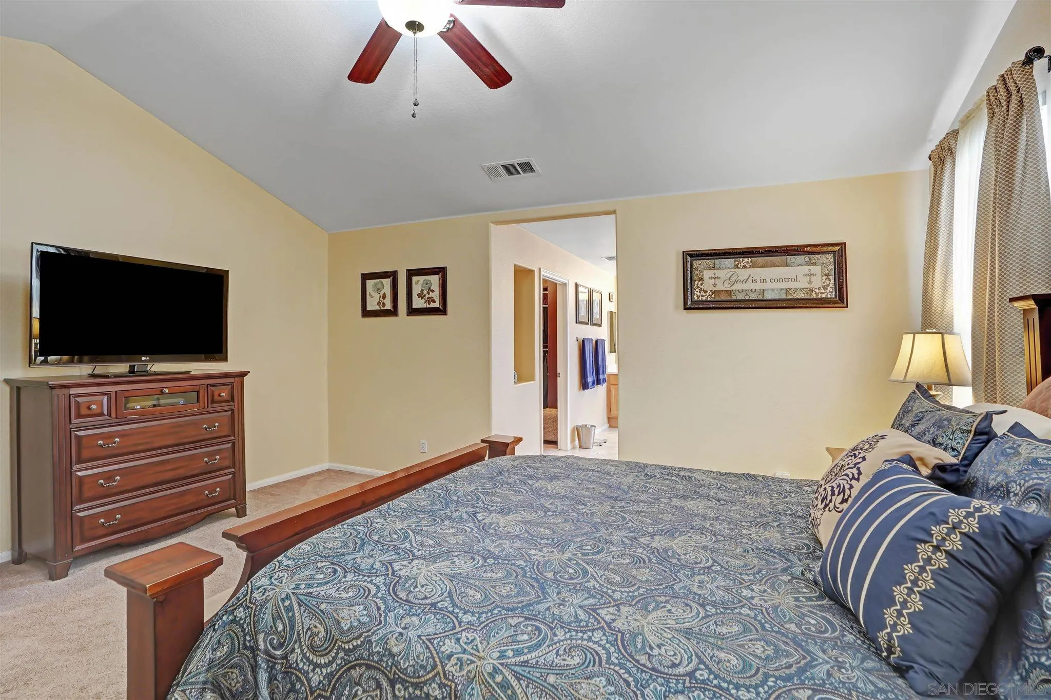 1266 Riviera Summit Road San Diego, CA 92154 - Photo 25 of 41 a bedroom with a bed and a flat screen tv