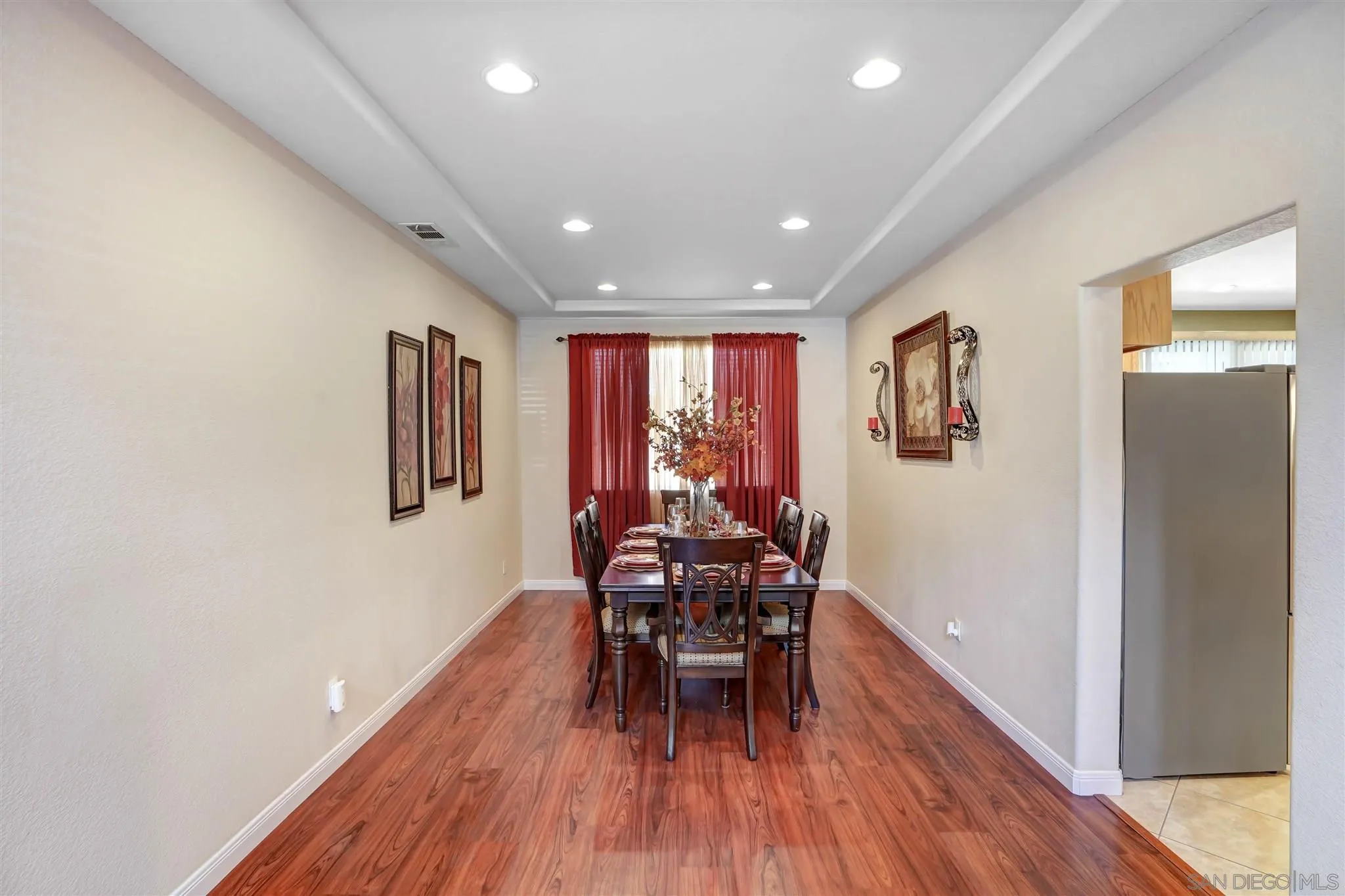 1266 Riviera Summit Road San Diego, CA 92154 - Photo 5 of 41 a view of a work space with wooden floor and furniture