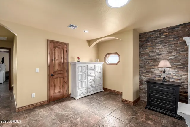 a view of empty room with front door