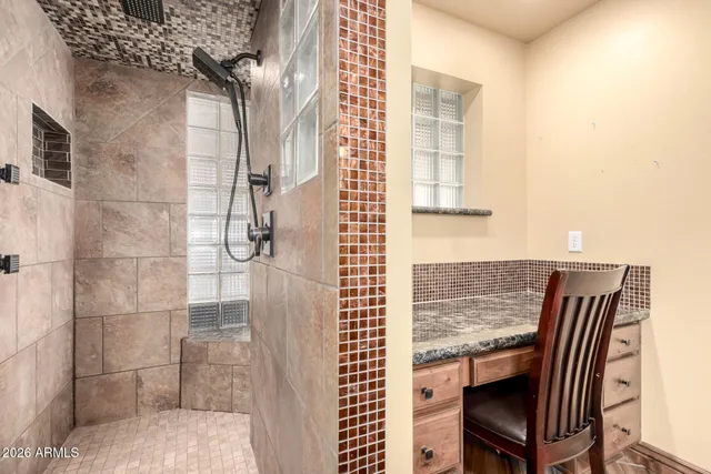 a view of a bedroom with a balcony