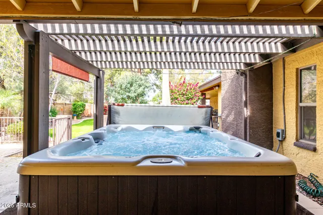a view of a living room and kitchen