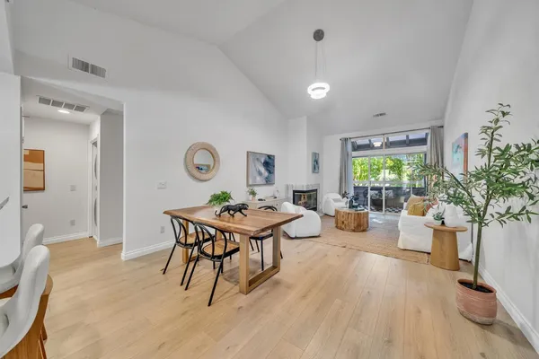 a living room with furniture and a table