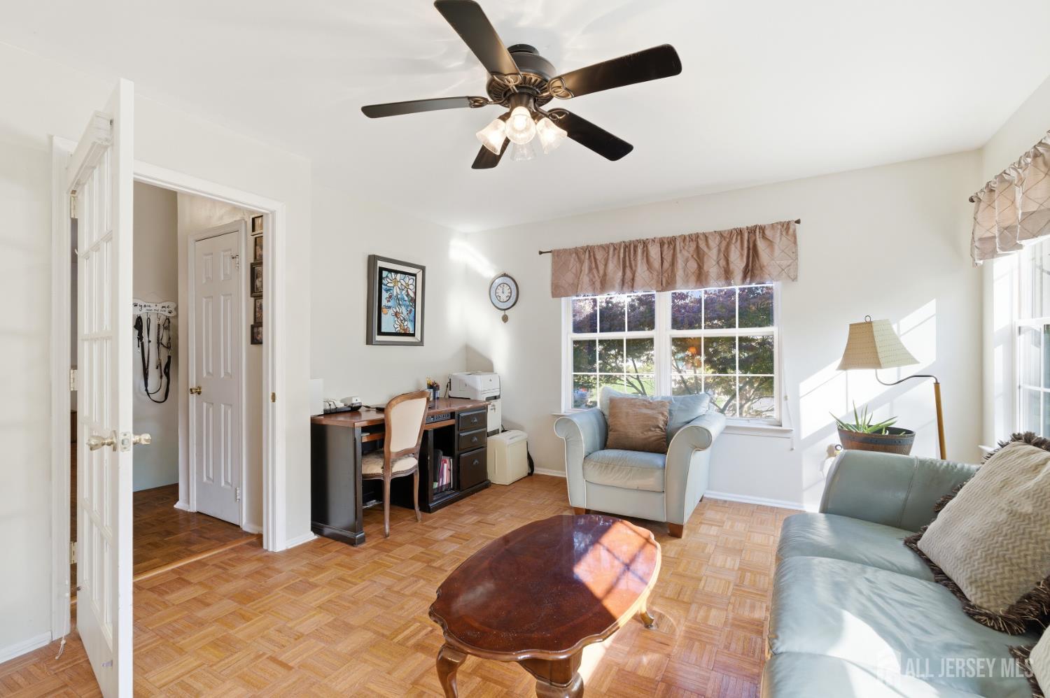 6 Shoshoni Way Somerville, NJ 08876 - Photo 12 of 52 a living room with furniture and a large window