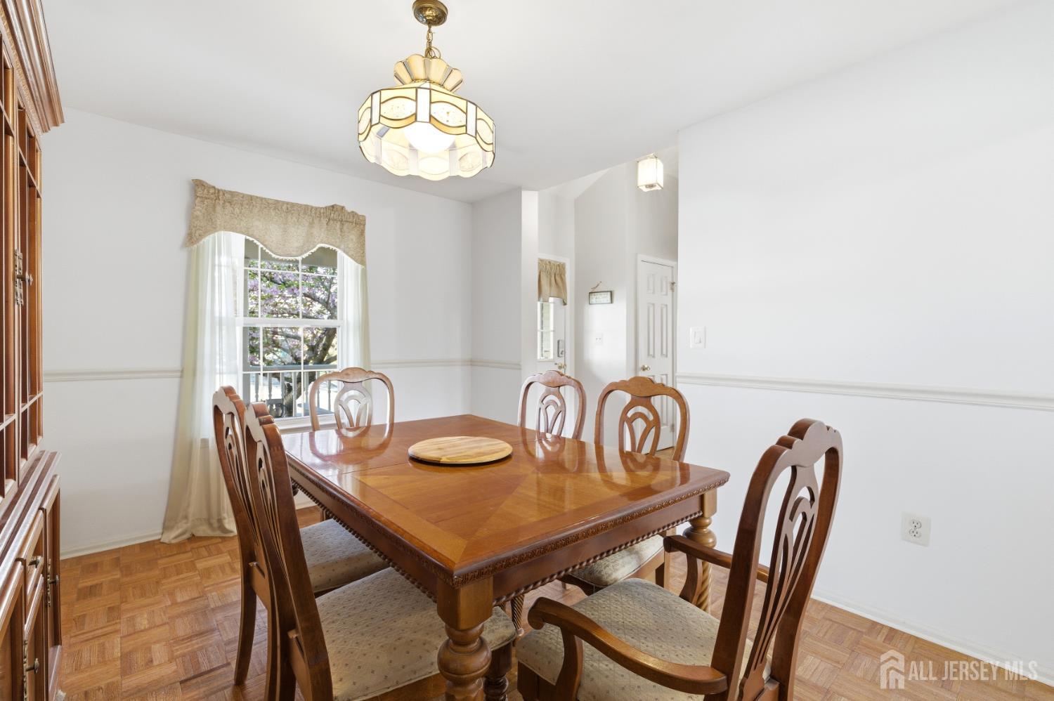 6 Shoshoni Way Somerville, NJ 08876 - Photo 14 of 52 a view of a dining room with furniture and chandelier