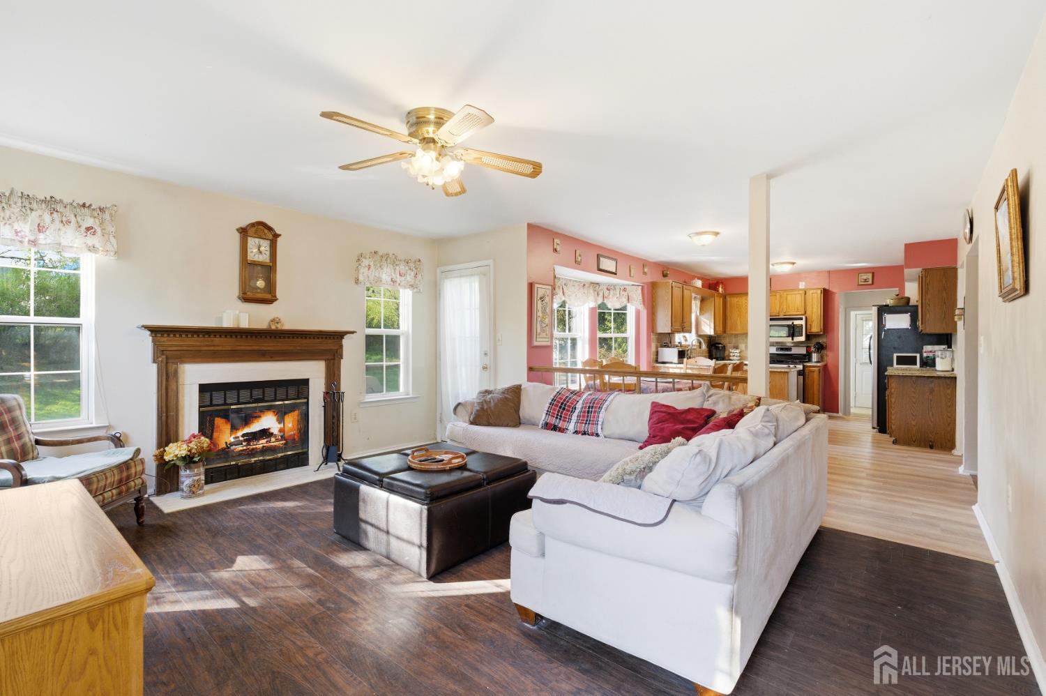 6 Shoshoni Way Somerville, NJ 08876 - Photo 16 of 52 a living room with furniture and a fireplace